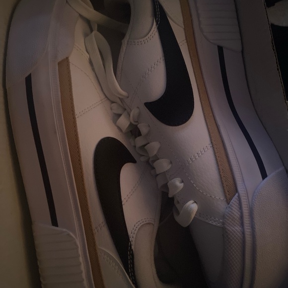 What Nike Classic White Sneakers with Black Swoosh